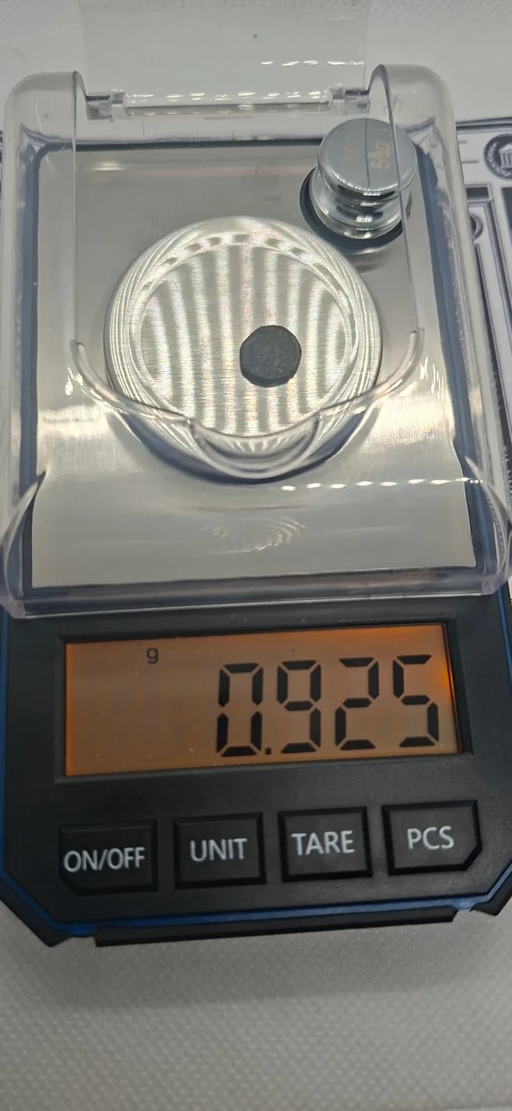 Peso (balança) da moeda TH-N-0084 — Marciano