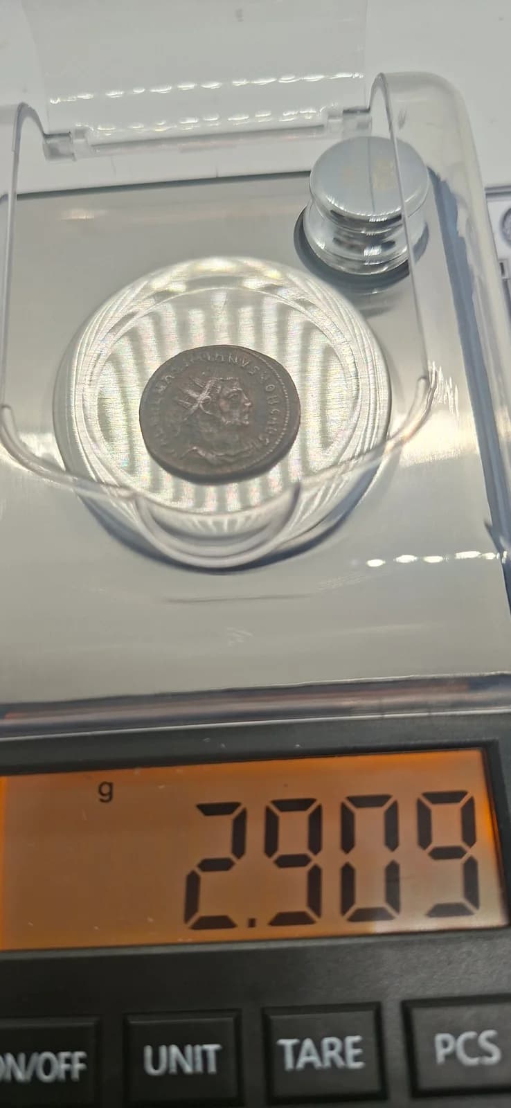 Peso (balança) da moeda TH-N-0097 — Galério